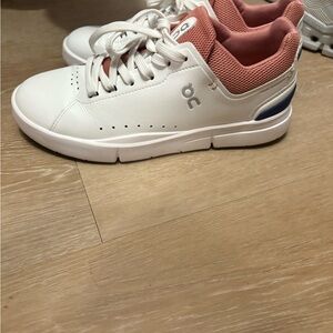 On Running White and Pink Sneakers